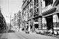 photo769-(ca. 1941) Hong Kong (China), commercial street with people, shops and signs(1)
