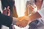 Businessmen making handshake in the city - business etiquette, c by Tong Patong on 500px