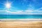 seascape and sun on blue sky