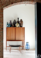 livingroom storage vases secretary doorframe view