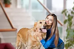 点击来源直接获取大图文件 |Pets concept. Young owner with cute dog
