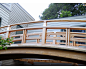 Japanese-style Bridge, Deck, Wisteria Pergola : Ki Arts built these structures to visually enhance and allow easier access to a Japanese bonsai garden.  The garden is a steep climb from the first floor of the residence, so the bridge is accessed