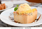 Ice cream with bread on plate - stock photo