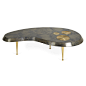 Jonathan Adler Trocadero Kidney Cocktail Table : Lacquered Vellum.An organic kidney shape covered in pieced and lacquered inky charcoal goatskin and adorned with three, inset sand-cast brass medallions. The pleasingly sinuous shape is finished with surpri