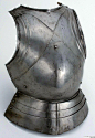 Breastplate "in the German style" Northern Italy (Milan), about 1480, steel; modern leather, the domed rivet in the center slides in a slot on the chest plate, allowing the wearer to flex his torso forward. The lipped edges at the neck and arms