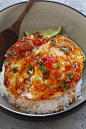 Egg meals with fried eggs and sweet chili sauce in a bowl.