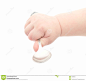 Baby's hand holding a spoon : Baby's Hand Holding A Spoon - Download From Over 63 Million High Quality Stock Photos, Images, Vectors. Sign up for FREE today. Image: 18088630