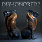 This may contain: two carved wooden cats sitting next to each other with the words dishonored 2 above them