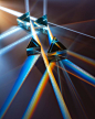 Perspective of genesis - Light rays in prism. Ray rainbow spectrum dispersion optical effect in glass prism.