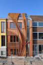 Multi-layerd wood Facade, shows the capability of wood.    24H> architecture  Leyden, The Netherlands