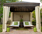 This is an example of a modern back patio in New York. — Houzz