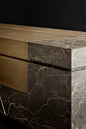 A big monolith in natural stone and bronze #marble #bronze #kitchen