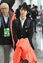 Pyeongchang Olympics men's figure skating gold medalist Yuzuru Hanyu of Japan arrives at Yangyang airport eastern South Korea on his way back to...