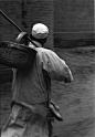 photo0087-(1933 or 1934) Gansu province (China), man carrying basket