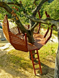We love this unique circular treehouse design. The shape really makes the most of the surface area.