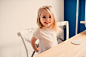 happy toddler girl having breakfast at home by Maria Kovalevskaya on 500px