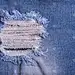 牛仔牛仔裤撕破，破坏，撕破蓝色补丁