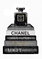 其中可能包括：a stack of chanel perfume bottles sitting on top of each other in black and white