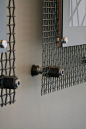 Autumn mounted a client's art work to this metal screen - love the industrial look and it makes the art stand out!: 