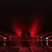 background-empty-red-dark-podium-with-lights-tile-floor-3d-rendering