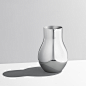 CAFU curvy, modern vase in mirror-polished stainless steel : CAFU modern vase in mirror-polished stainless steel. Visit the online store for easy shopping
and beautiful gift wrapping. Discover our centrepiece vase collection.