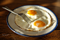 Fried eggs on the tray with the light blue platter