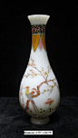 Peking glasses are made at a extremely high temperature (over 1000℃), that's why it has higher density and more beautiful color than regular glass.    This colorful vase is made of Peking glass and has birds & flowers hand painting on the body. It is 