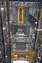 KSC-20160307-PH_DNG0001_0074 : A 250-ton crane is used to lift the second half of the K-level work platforms for NASA’s Space Launch System &#;40SLS&#;41 rocket high above the transfer aisle inside the Vehicle Assembly Building at NASA's Kennedy S