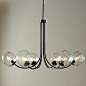 Trying to find a non-typical mid century chandelier for my dining room. What do you think? Eclipse Chandelier #WestElm: 