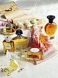Nice collection of classic perfumes! I see Femme Rochas, Chanel No 5, Jean Patou "Joy" Guerlain "Shalimar", Nina Ricci "L'air du Temps".....: 