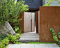 Inspiration for a modern partial sun front yard stone garden path in Seattle.