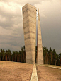 View tower in Nebra, Saxony-Anhalt state, Germany. At a site dedicated to astronomy and archeology. The narrow vertical slit separating the two components along its entire length indicates the hour on the slope. Opened 2007; architects: Holzer & Koble
