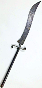 Persian sword mounted with a mace like long handle but having a sword blade, the blade is engraved with mirror floral pattern and gold koftgari of great quality. The engravings are high quality showing a good age and of typical Persian origin. Possible a