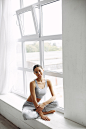 beautiful-girl-sitting-windowsill