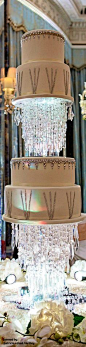 This five-tiered cake stood six feet tall and had over 4,000 Swarovski Crystals.: 