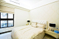 现代简约风格三室二厅110平家居卧室床灯具装修效果图
