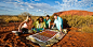 位于澳大利亚北部炎热红土中心地区的乌鲁鲁卡塔丘塔国家公园，在1994年被联合国教科文组织划定为世界遗产保护区，成为了世界上第二个被称为“文化景观”的世界遗产。这处由乌鲁鲁巨岩（艾尔斯岩）和卡塔丘塔岩山构成的红土地，亦是阿南古人（Anangu）生存了上万年的家园。而在当地原住民传说中，这片蕴含了无数自然之美的领地正是由他们的祖先创造。而如今在乌鲁鲁奇特的洞穴里，人们还能看到原住民祖先们留下的各种线条分明，圈点众多的古老绘画和岩雕。
目前乌鲁鲁卡塔丘塔国家公园由阿南古人原住民部族和澳大利亚公园（Parks A