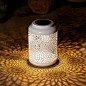 This classic solar lantern with delicate cutouts creating intriguing graphic shadows, adds artisan beauty and flickering drama to your outdoor space. Use it to convert your garden, patio or yard to be a bright, charming and delightful environment. It will