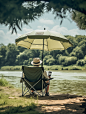 mmeyer3357_A_man_fishing_by_a_river_man_sitting_on_a_chair_fish_9e48d4c3-e56f-4ece-865b-c3b4c0979f94.png (1856×2464)