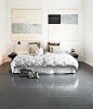 Grey Floors + Simple Furnishings + Large Artwork +Via CocoCozy Blog