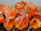 难得一见的宝石原石：橘红色锰铝榴石   
产地：非洲 