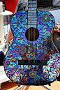 Stained glass guitar: A one-of-a-kind piece of stunning stained glass art. If I played guitar-this bad boy would be mine