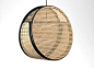 Jacaranda Lamp - est living | exceptional living : The natural rattan and woven cane webbing on the Jacaranda Lamp, designed by Dennis Abalos is inspired by the shape of a Jacaranda seed pod, casting shadows when lit up. Available with either a black or n