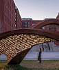 ‘hello' in 101 languages lights up this corten steel sculpture in beijing