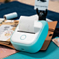 Phomemo T02 Mini Pocket Thermal Printer | Cyan : Phomemo T02 Portable Bluetooth Mini Pocket Thermal Printer have 2 color to select. T02 printer kitty-shaped silicone cover with three color options is so protective that it acts as a cushion to prevent any 