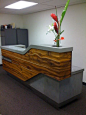 sculptural reception desk, with sculpture instead of plant on the end: 