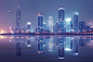 海滨城市高楼灯光夜景摄影图