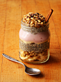 Chia Seed Pudding Breakfast Parfait - layers starting from the bottom: sliced banana, pumpkin flax granola, chia seed pudding (chia seeds, hemp hearts, shaved dark chocolate, cinnamon, and soy milk,) sliced banana, strawberry coconut yogurt, chia seed pud