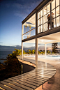 Couple hugging in illuminated modern house by Gable Denims on 500px