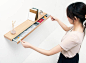 Clopen Shelf by Torafu Architects 1 Magnets Hiding Storage Space In 34mm Thick Shelf